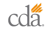The image displays a logo with the letters  CDA  in capitalized white font against a dark background, followed by a small graphic resembling a leaf or a stylized plant element.